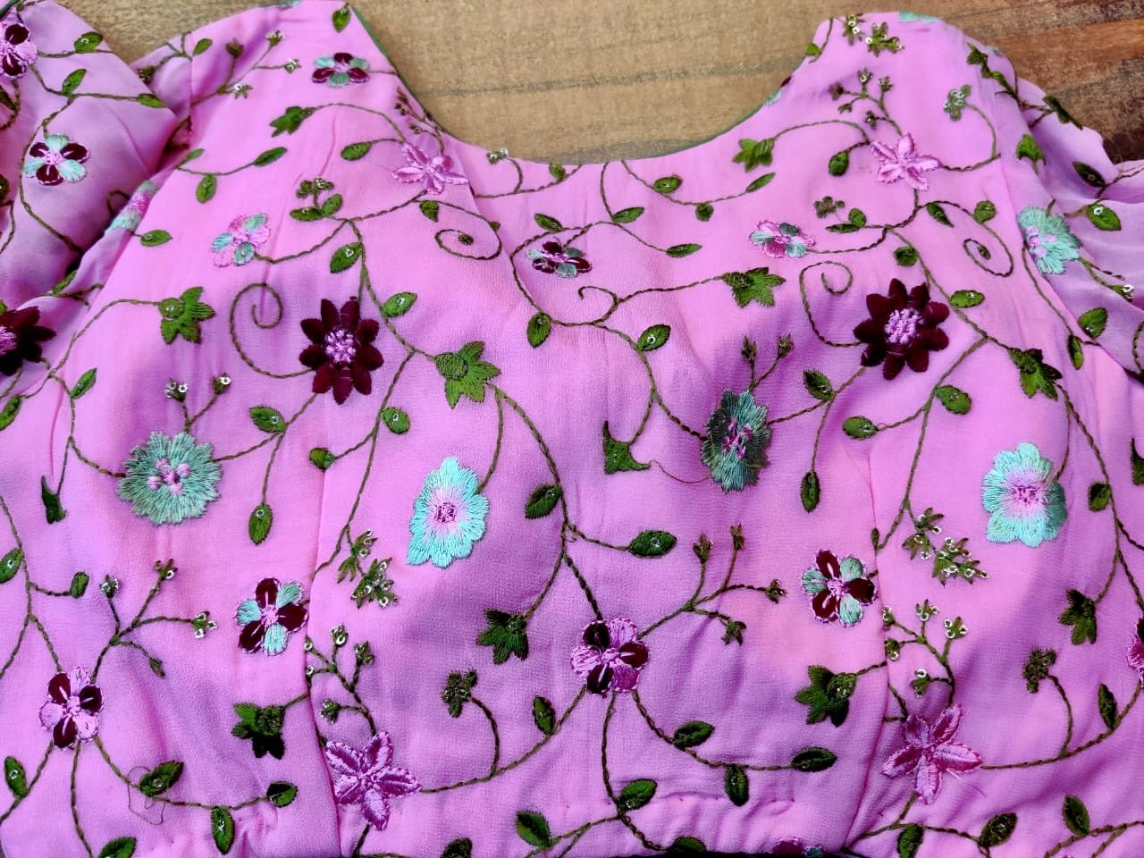 Buy stunning mauve pink embroidered saree blouse online in USA with balloon sleeves. Elevate your ethnic saree style with a tasteful collection of designer sari blouses, embroidered saree blouses, Banarasi blouse, silk sari blouse from Pure Elegance Indian clothing store in USA.-back