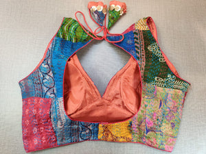 Shop stunning multicolor Kantha work sleeveless sari blouse online in USA. Elevate your Indian ethnic saree looks with beautiful readymade sari blouse, embroidered saree blouses, Banarasi sari blouse, designer saree blouse from Pure Elegance Indian clothing store in USA.-back