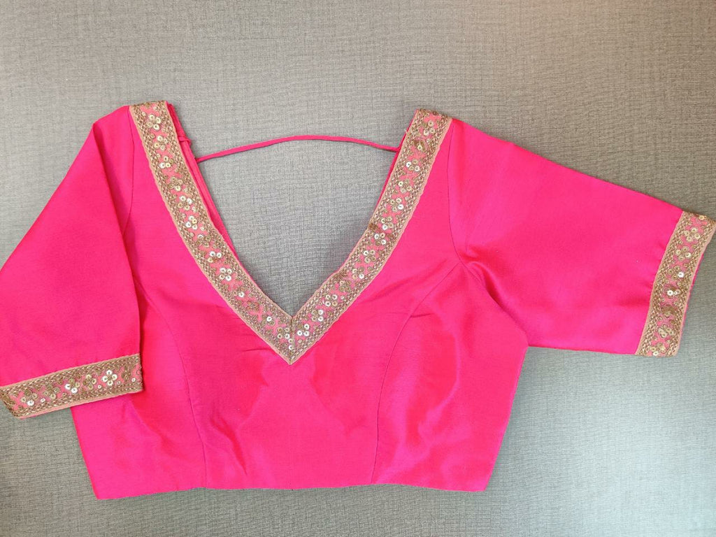 Buy stunning neon pink embroidered sari blouse online in USA. Elevate your Indian ethnic saree looks with beautiful readymade saree blouse, embroidered saree blouses, Banarasi saree blouse, designer sari blouses from Pure Elegance Indian fashion store in USA.-full view