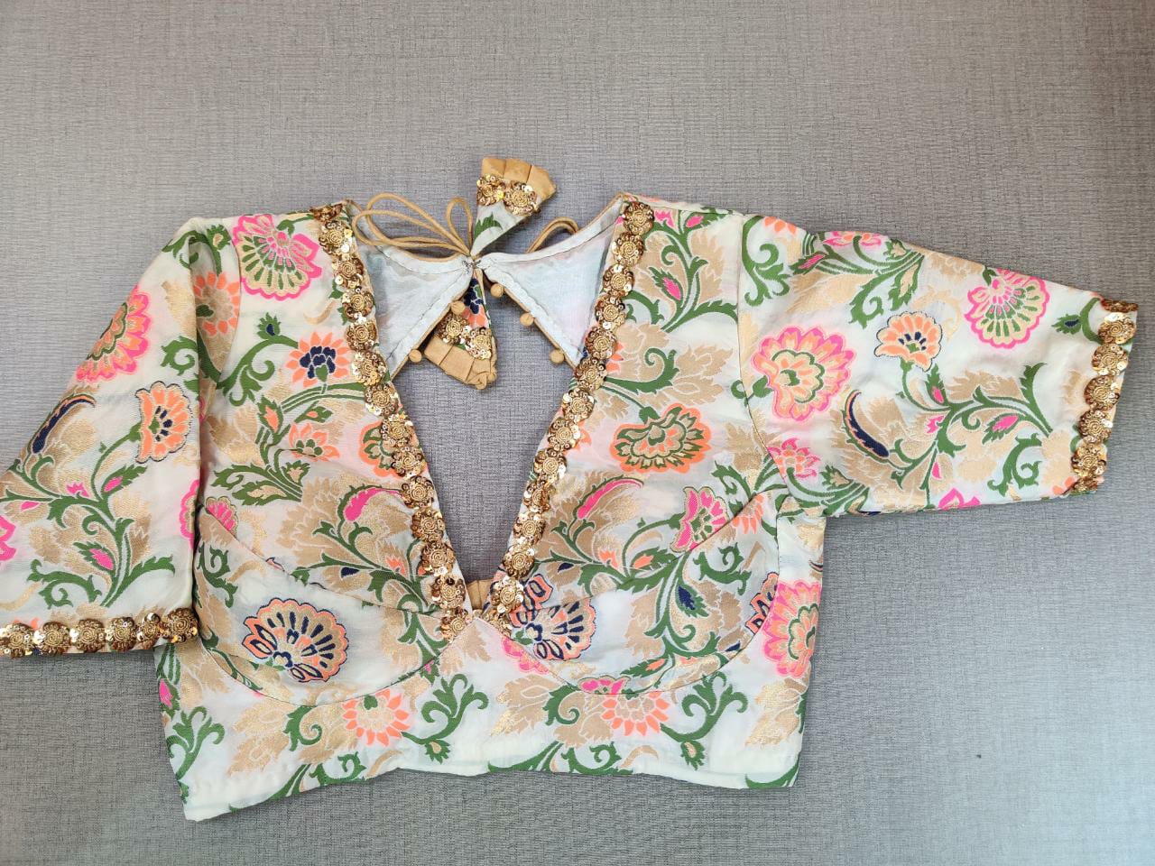 Shop beautiful cream embroidered neckline Banarasi sari blouse online in USA. Elevate your Indian ethnic saree looks with beautiful readymade saree blouse, embroidered sari blouses, Banarasi saree blouse, designer sari from Pure Elegance Indian fashion store in USA.-full view