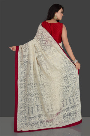 Buy elegant off-white embroidered georgette saree online in USA with saree blouse. Radiate elegance with embroidered sarees with blouse, georgette sarees from Pure Elegance Indian fashion boutique in USA. We bring a especially curated collection of ethnic saris for Indian women in USA under one roof!-back