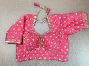 Shop stunning pink saree blouse online in USA with sequin embroidery. Elevate your Indian ethnic saree looks with beautiful readymade saree blouse, embroidered sari blouses, Banarasi saree blouse, designer sari from Pure Elegance Indian fashion store in USA.-front