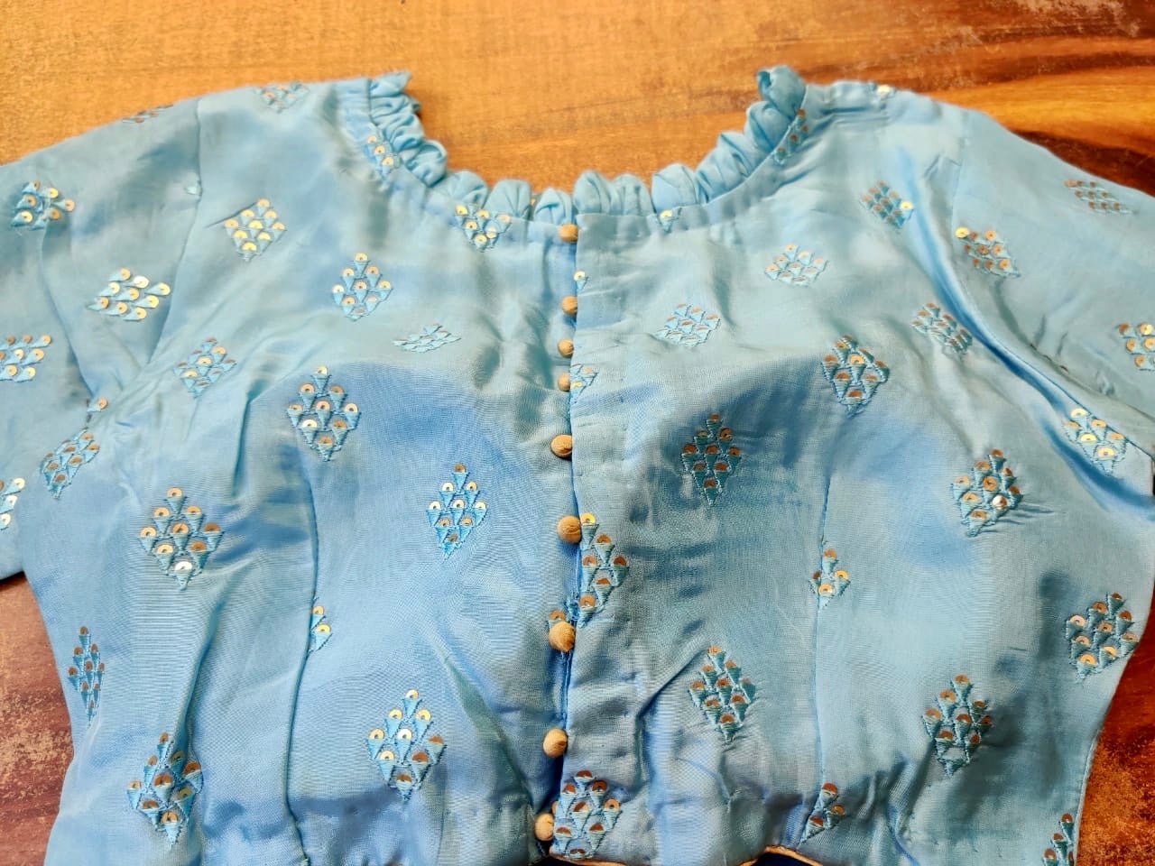 Buy light blue embroidered designer saree blouse online in USA. Elevate your ethnic saree style with a tasteful collection of designer saree blouses, embroidered sari blouses, Banarasi blouses, silk saree blouse from Pure Elegance Indian clothing store in USA.-back