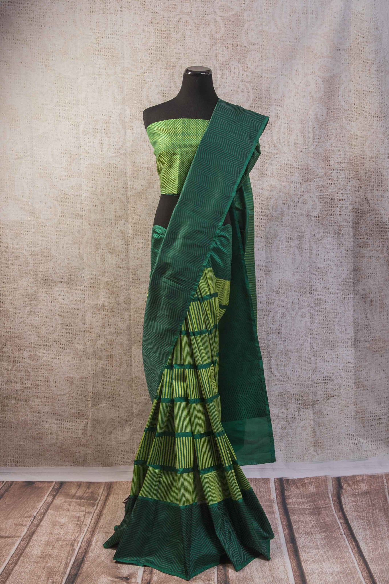 90b256 Multi green Banarasi silk saree with zig zag stripes & satin black pallu. The simple sari is available at our Indian clothing store in USA, Pure Elegance. This one is perfect for parties, get-togethers and functions!