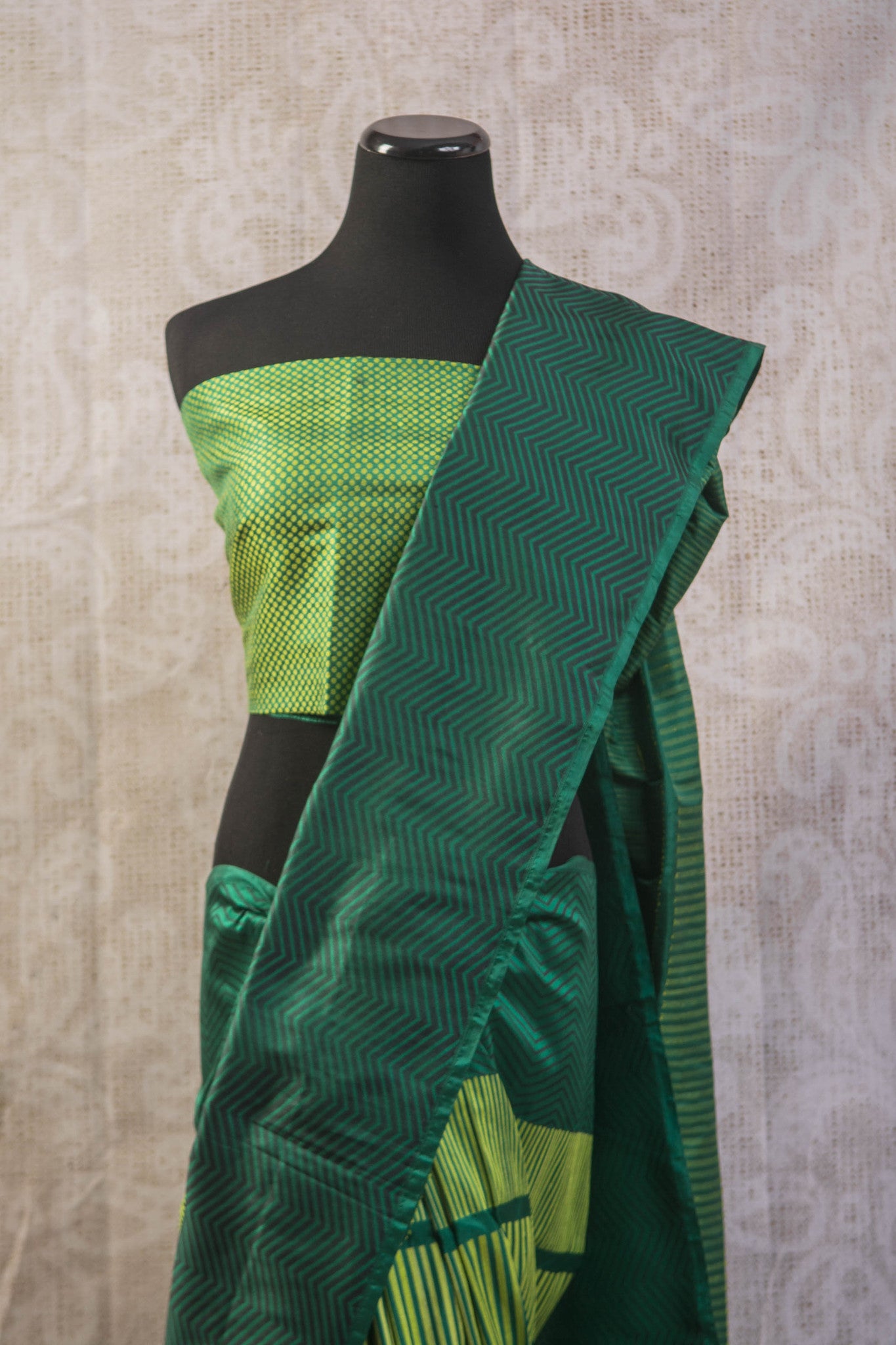 90b256 Multi green Banarasi silk saree with zig zag stripes & satin black pallu. The simple sari is available at our Indian clothing store in USA, Pure Elegance. This ethnic outfit is a great pick for parties, get-togethers and functions!