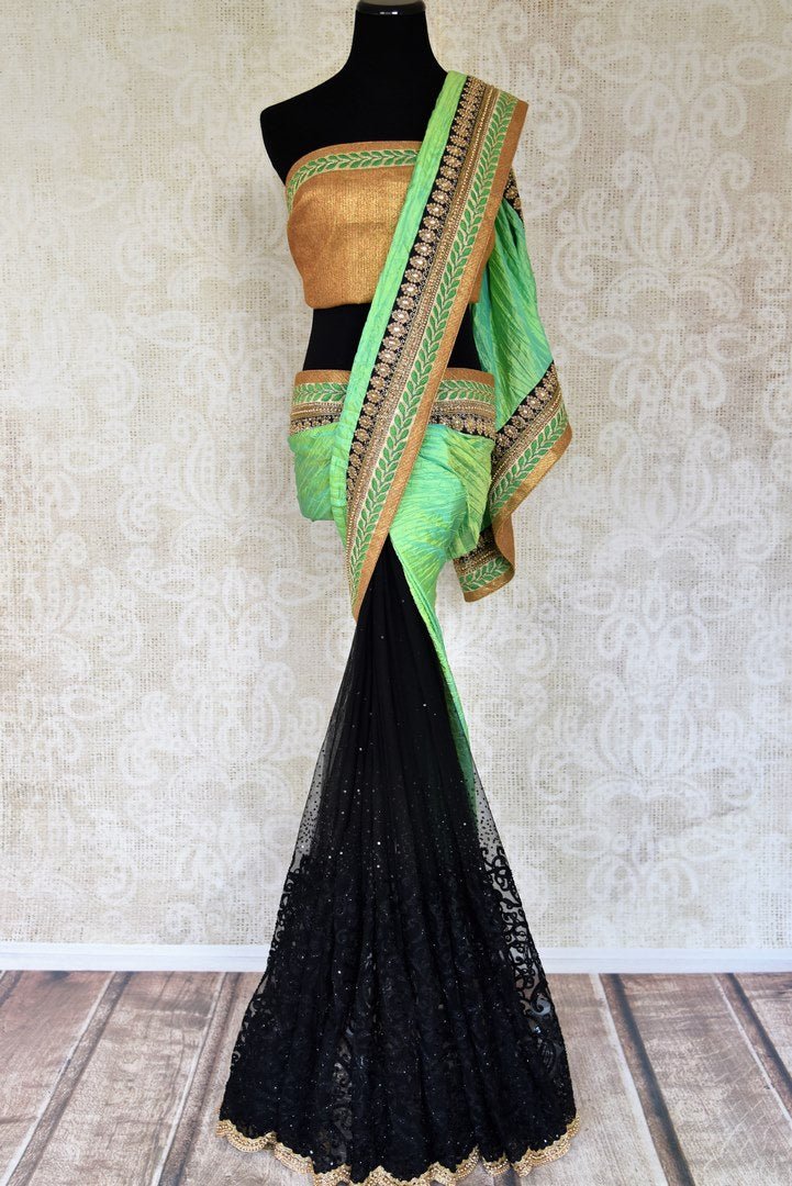 Buy green silk and black net embroidered half and half saree online in USA from Pure Elegance. Let your ethnic style be one of a kind with an exquisite variety of Indian handloom sarees, pure silk sarees, designer sarees from our exclusive fashion store in USA.-full view