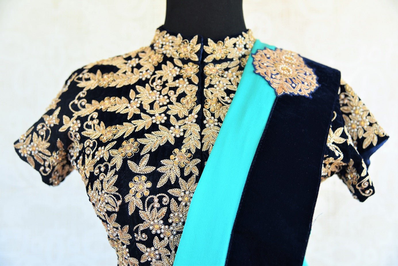 Black solid velvet ethnic Indian designer blouse from Pure Elegance with heavy zari and bead work is perfect for any wedding. Buy online or from our USA store. Front View.