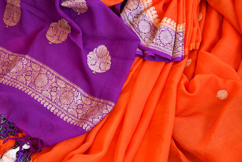Classic color combination of orange and purple in georgette banarasi saree. Perfect sari for festivals.-close up