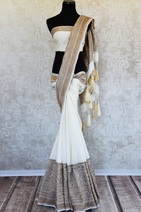 White muga banarasi pure handloom saree. Ethnic saree perfect for Indian pujas, festivals and in weddings.-full view