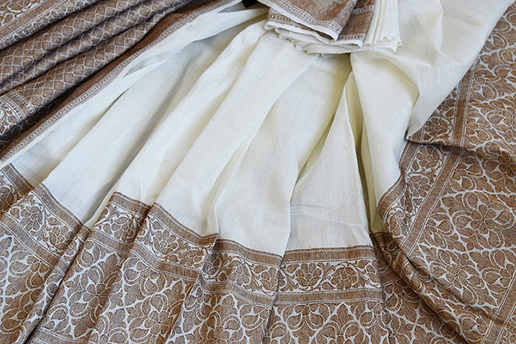 White muga banarasi pure handloom saree. Ethnic saree perfect for Indian pujas, festivals and in weddings.-close up