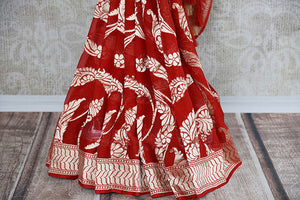 Red and gold georgette banarasi saree with gold jaal all over with beautiful pallu. Perfect for Indian weddings.-pleats