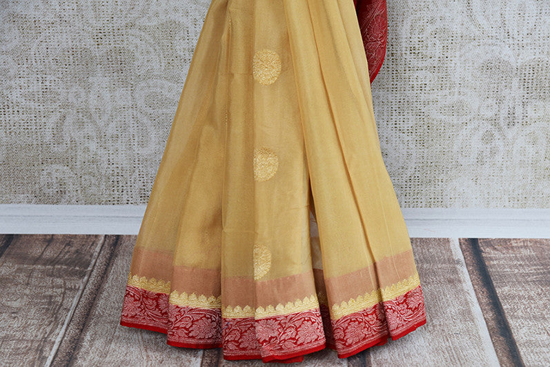 Beige and red chiffon banarasi saree. Traditional as well modern sari perfect for Indian wedding and reception.- pleats  and border