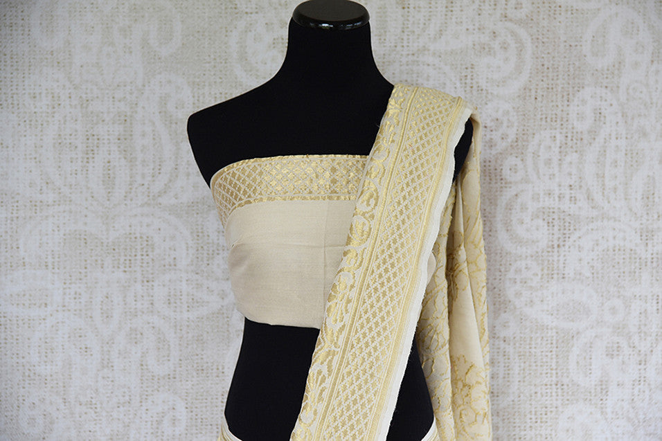 Classic and elegant off white hand woven muga banarasi saree. Perfect for festivals and pujas.-pallu view