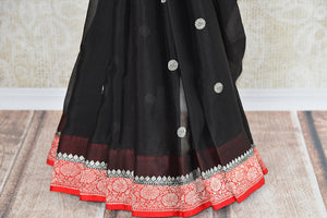 Black georgette chiffon saree with red banarasi border and pallu. Modern saree with ethnic look.- pleats