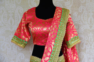 Buy yellow and pink half Banarasi and half silk embroidered sari online in USA with blouse.  Our fashion store brings a beautiful range of Indian designer saris in USA.-pallu
