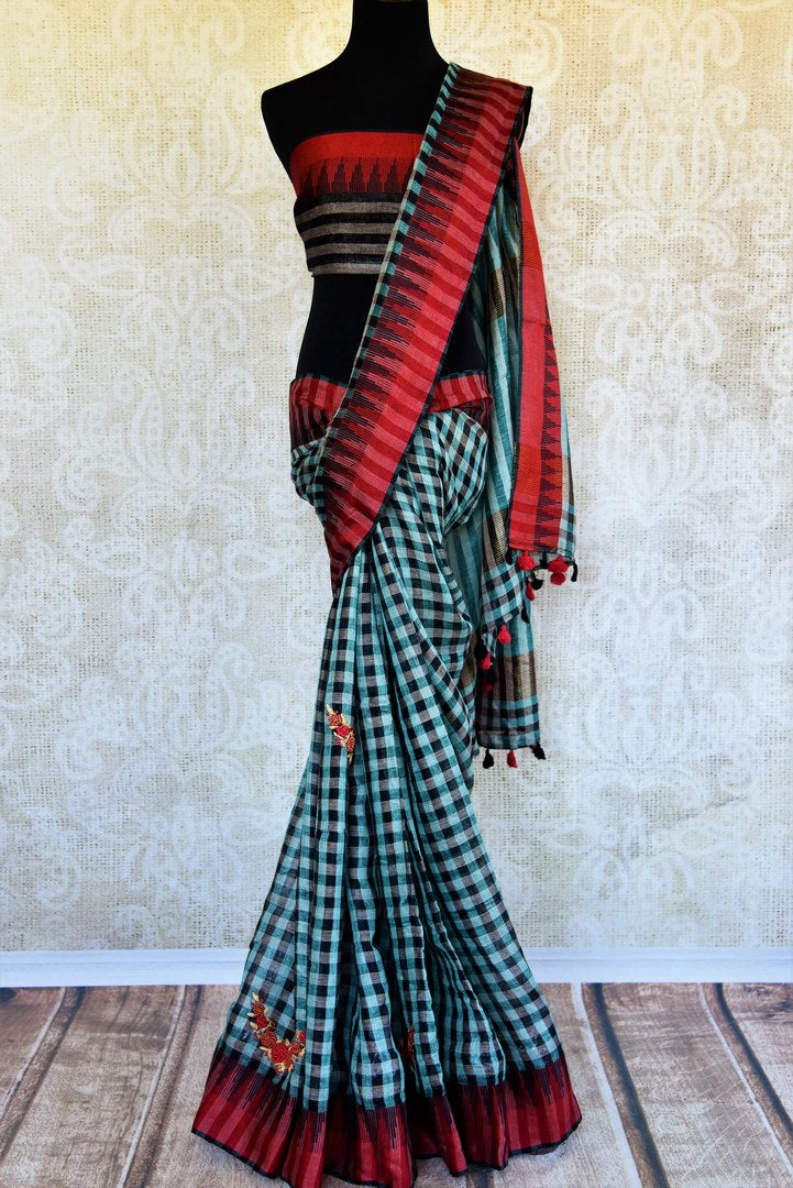 Buy green and black checker embroidered linen saree online in USA. Pure Elegance clothing store brings an exquisite range of Indian woven linen sarees online in USA.-full view