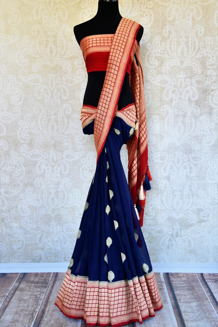 Buy blue georgette Banarasi saree with red border online in USA. Pure Elegance store brings an exquisite range of Indian Banarasi georgette sarees in USA for women.-full view