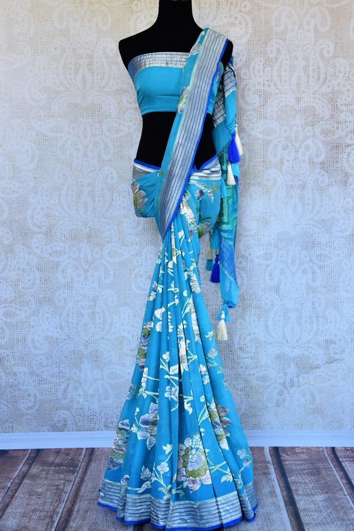 Buy turquoise blue georgette Banarasi saree online in USA. Pure Elegance store brings an exquisite range of Indian Banarasi georgette sarees in USA for women. Shop online.-full view