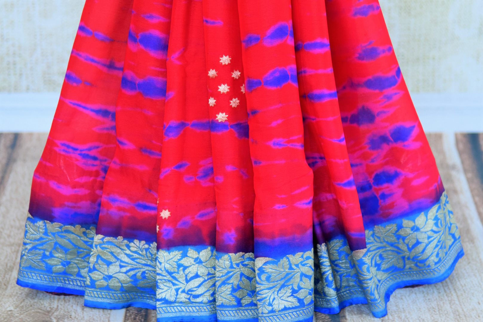 Buy red and blue georgette Banarasi sari online in USA. Pure Elegance store brings an exquisite collection of Indian Banarasi sarees for online shopping in USA. -pleats