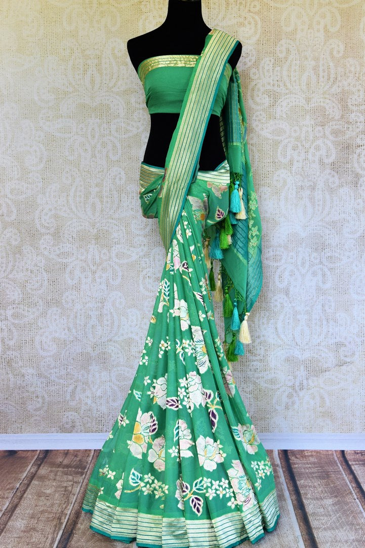 Buy green georgette Banarasi saree online in USA. Pure Elegance store brings an exquisite range of Indian designer Banarasi sarees for online shopping in USA. Shop now.-full view