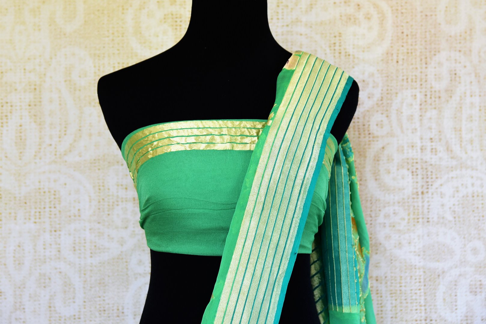 Buy green georgette Banarasi saree online in USA. Pure Elegance store brings an exquisite range of Indian designer Banarasi sarees for online shopping in USA. Shop now.-blouse pallu