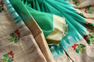 Buy green resham work kora silk sari online in USA. Pure Elegance clothing store brings an exquisite range of Indian woven silk sarees in USA for women. Shop online.-details