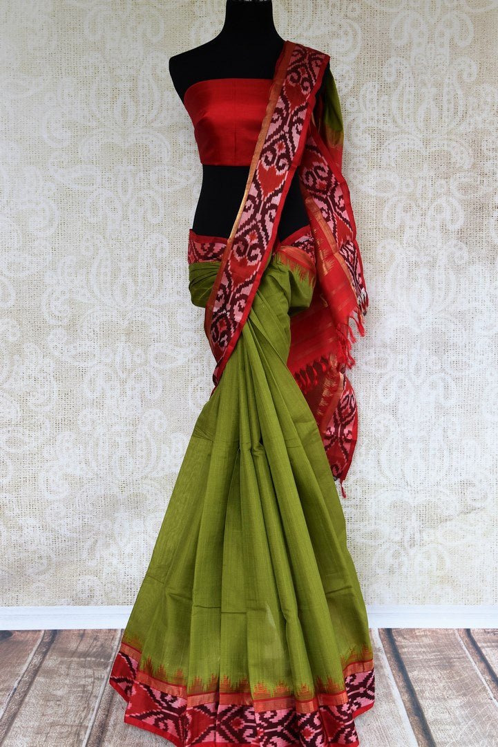 Buy green eri silk saree online in USA with red border. Pure Elegance clothing store brings an exquisite range of Indian silk sarees in USA for women. Shop online.-full view