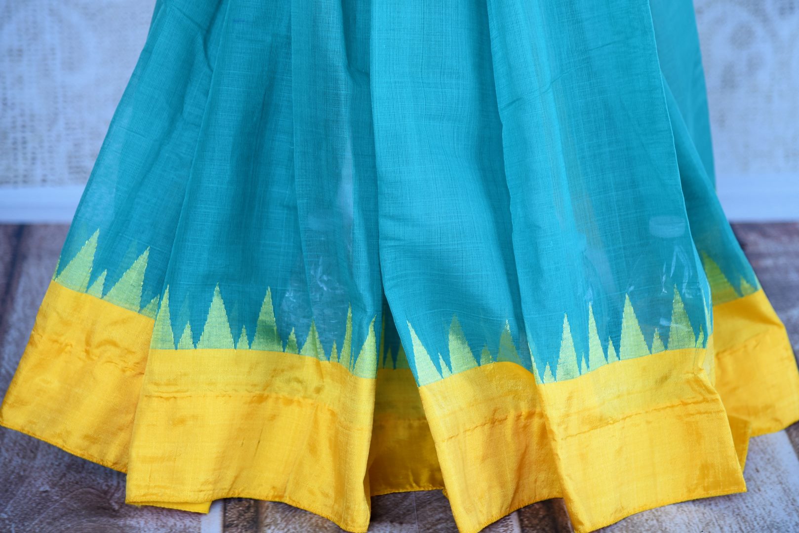 Buy light blue ikkat khaddi saree online in USA. Pure Elegance clothing store brings an alluring collection of ethnic Indian ikat sarees in USA for women. Shop online.-pleats