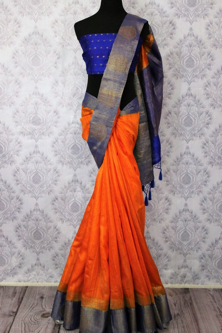 Buy orange tussar Banarasi sari online in USA with blue border. Browse through a range of exclusive Indian designer sarees in USA at Pure Elegance online store. Shop now.-full view