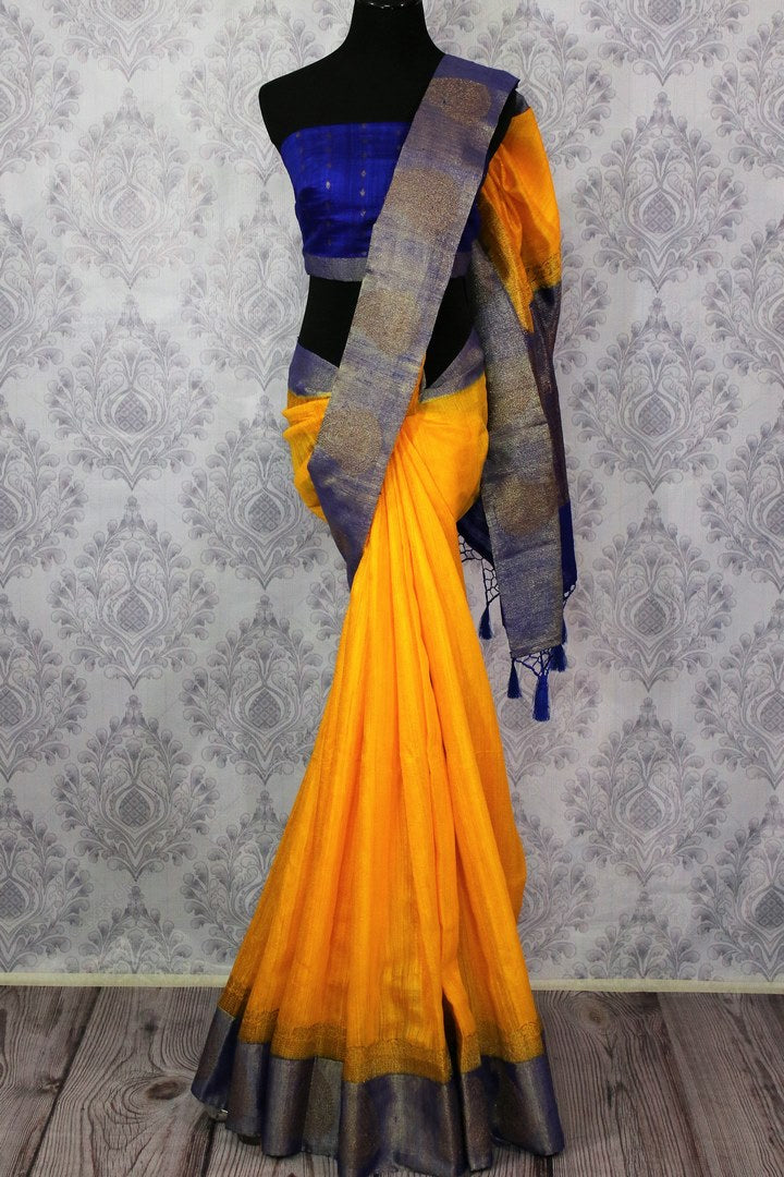 Shop yellow tussar Banarasi sari online in USA with blue border. Browse through a range of exclusive Indian handloom sarees in USA at Pure Elegance online store. -full view