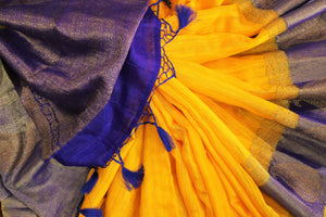 Shop yellow tussar Banarasi sari online in USA with blue border. Browse through a range of exclusive Indian handloom sarees in USA at Pure Elegance online store. -details