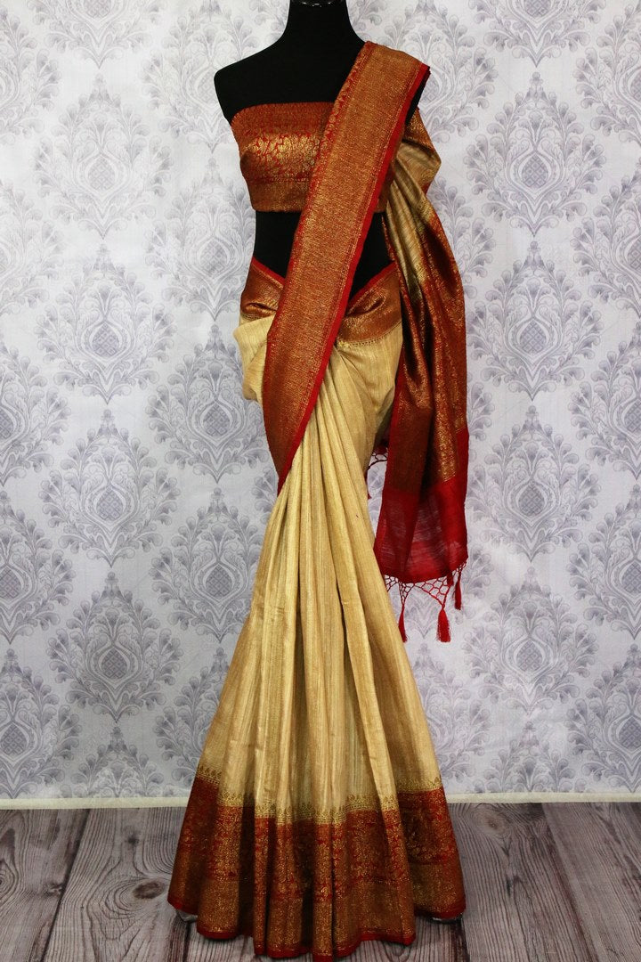 Buy beige tussar Banarasi saree online in USA with red border. Browse through a range of exclusive Indian handloom sarees in USA at Pure Elegance online store.-full view
