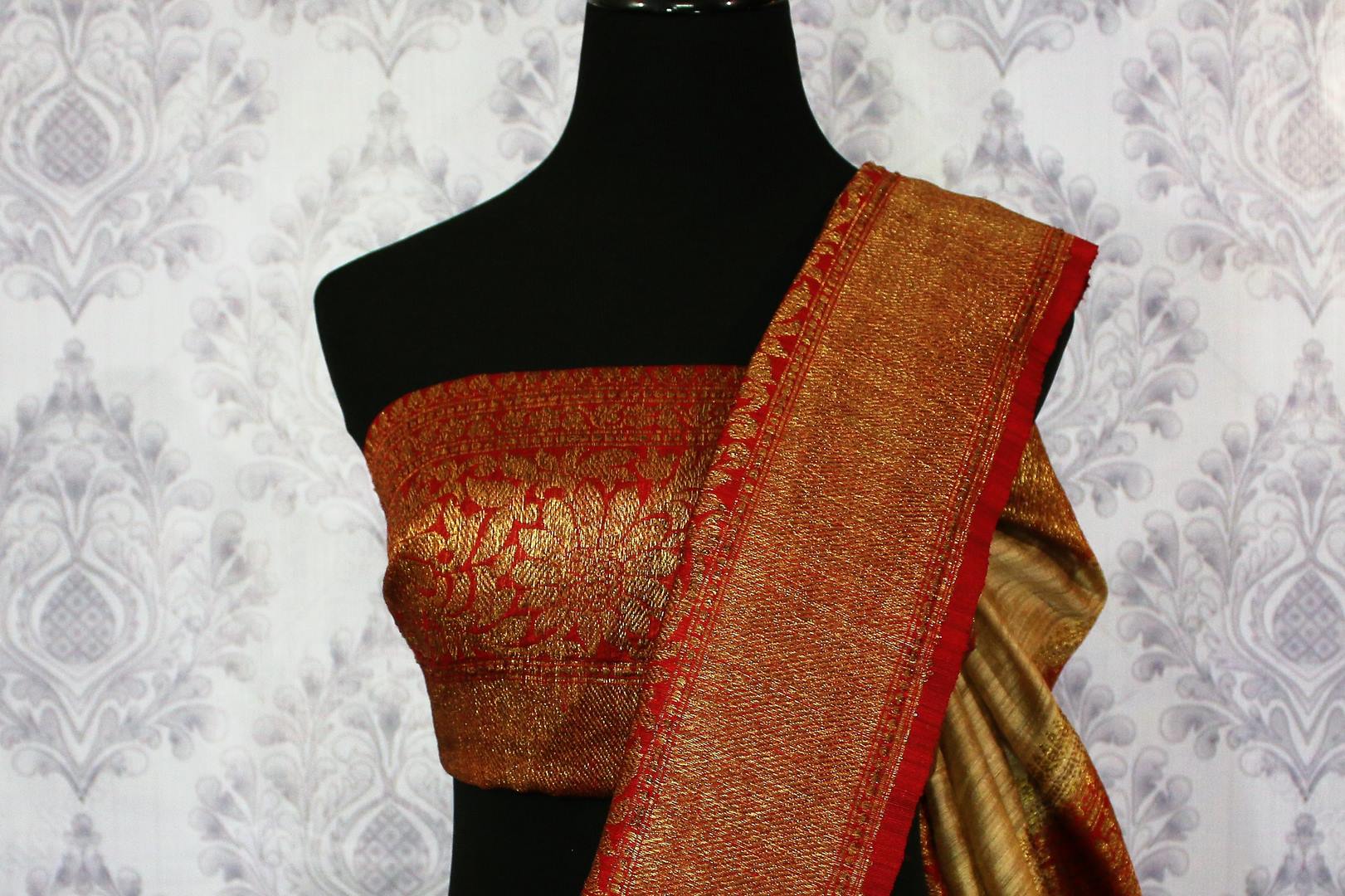 Buy beige tussar Banarasi saree online in USA with red border. Browse through a range of exclusive Indian handloom sarees in USA at Pure Elegance online store.-blouse pallu