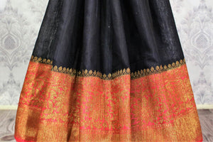 Shop black Banarasi tussar saree online in USA with pink border. Browse through a range of traditional Indian sarees in USA at Pure Elegance online store. Shop now.-pleats