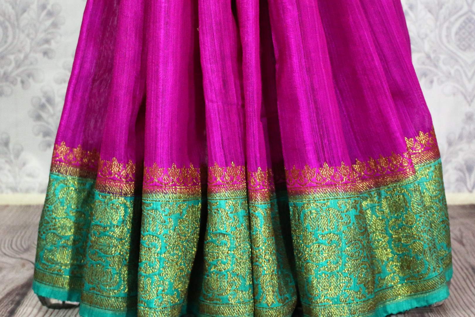 Buy dark pink Benarasi tussar saree online in USA with blue border. Browse through a range of traditional Indian sarees in USA at Pure Elegance online store. Shop now.-pleats