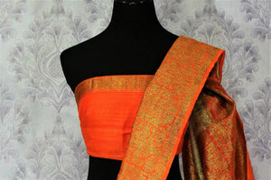 Buy cream Benarasi tussar saree online in USA with orange border. Browse through a range of traditional Indian sarees in USA at Pure Elegance online store. Shop now.-blouse pallu
