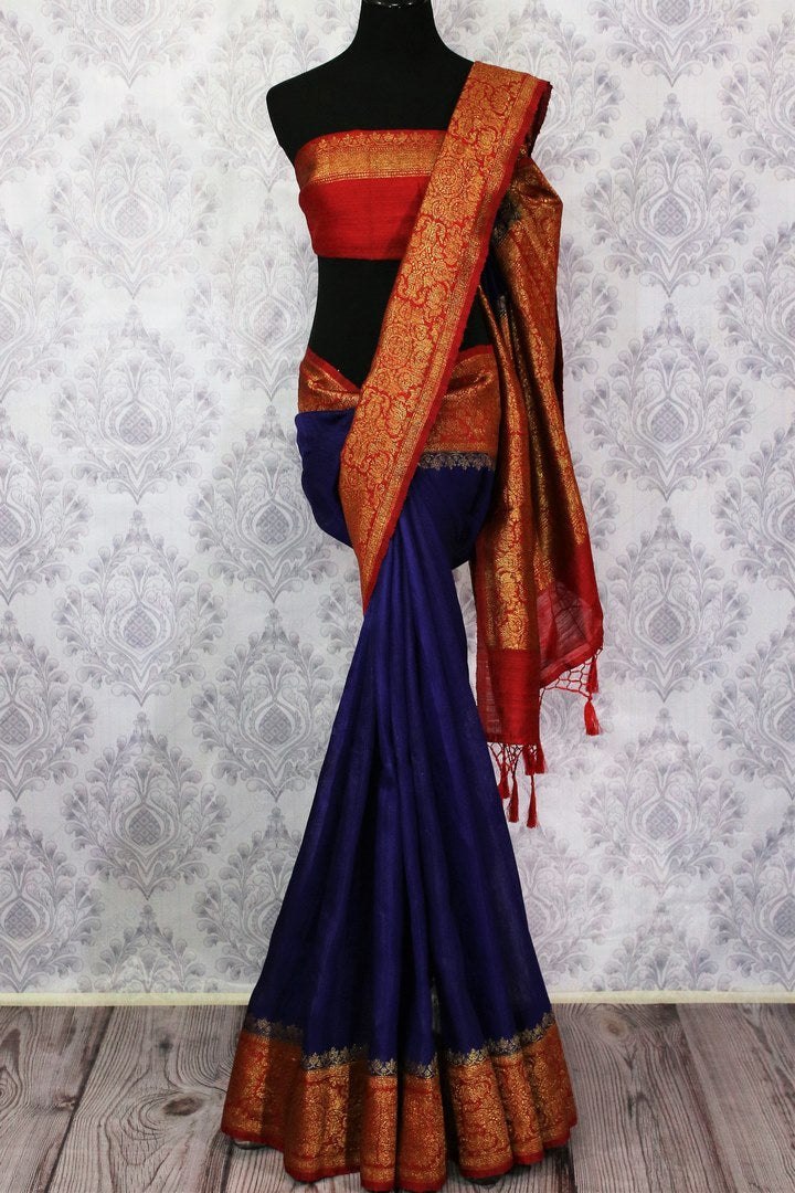 Buy blue Benarasi tussar saree online in USA with red border. Browse through a range of traditional Indian sarees for weddings at Pure Elegance online store. Shop now.-full view