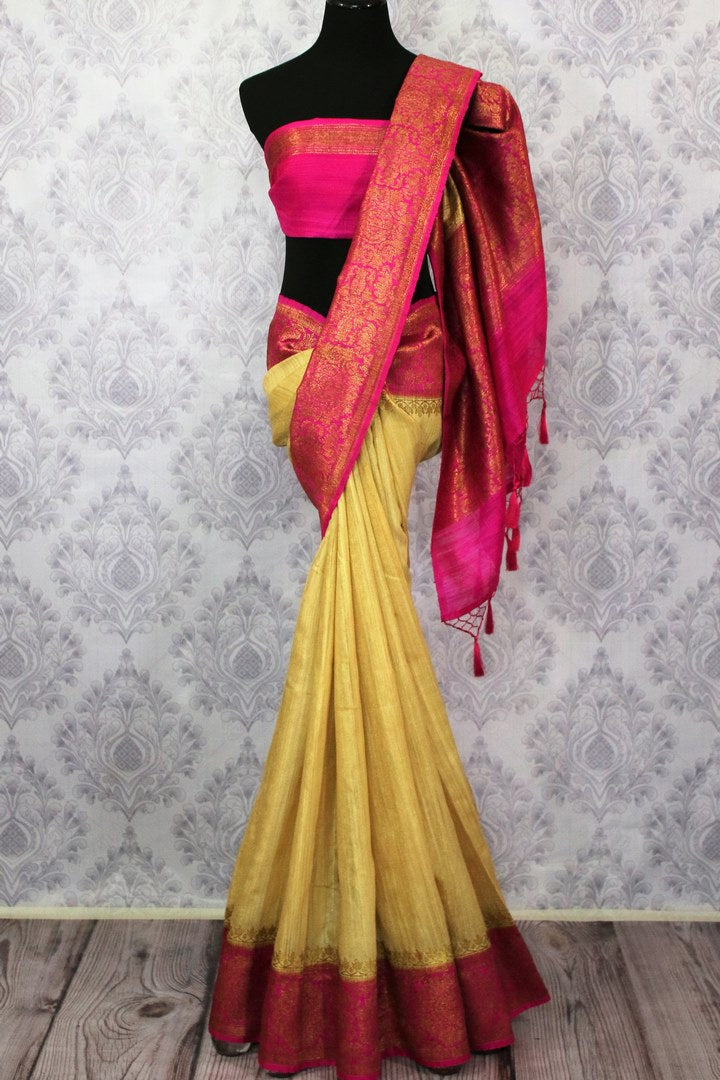 Buy cream Benarasi tussar saree online in USA with pink border. Browse through a range of traditional Indian sarees for weddings at Pure Elegance online store.-full view