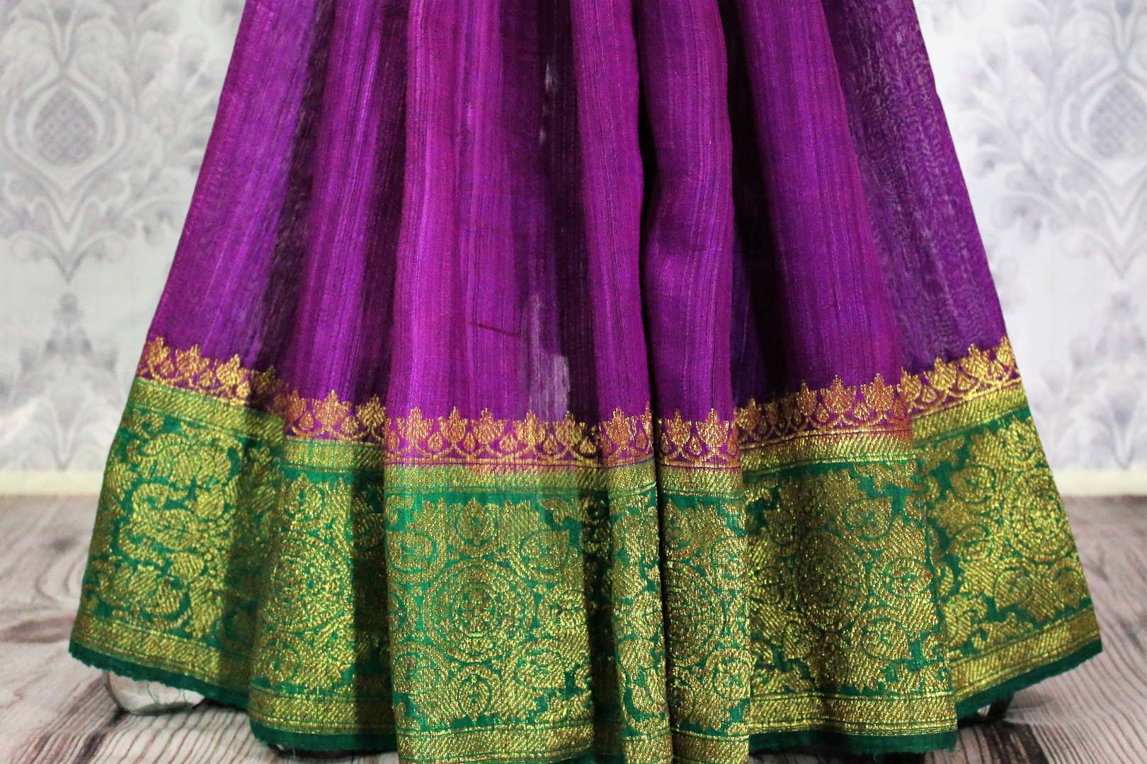 Purple Banarasi tussar saree buy online in USA with green border. Browse through a range of traditional Indian sarees for parties at Pure Elegance online store-pleats