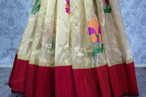 Shop elegant cream tissue Benarasi saree online in USA. Browse through a range of beautiful Indian designer saris in USA at Pure Elegance online store. Shop now.-pleats