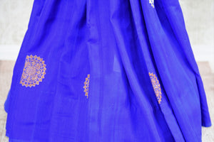 Buy blue muga silk Banarasi sari with buta online in USA. Choose from a range of traditional Indian silk saris at Pure Elegance online store or visit our store in USA.-pleats