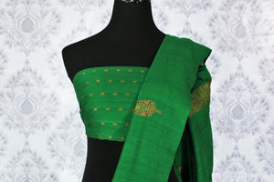 Elegant green muga Banarasi sari with buta buy online in USA. Shop the latest design Indian designer sarees from Pure Elegance clothing store in USA for women.-blouse pallu