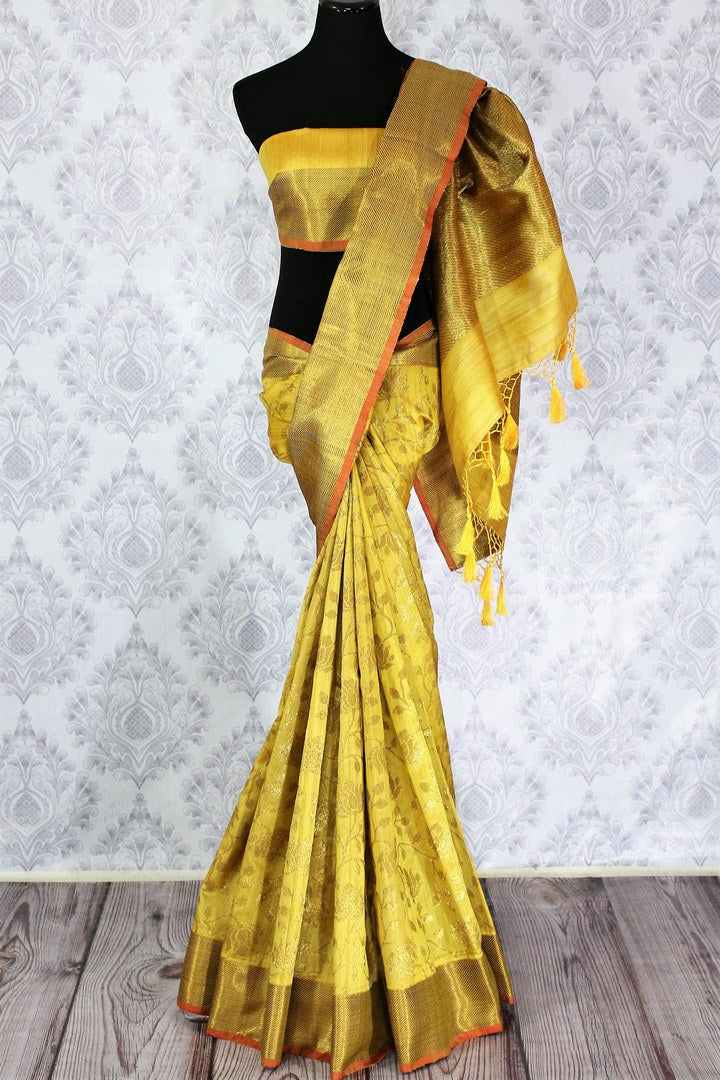 Yellow Muga Benarasi sari with golden border buy online in USA. Explore a range of exclusive Banarasi sarees in USA at Pure Elegance Indian clothing store.-full view