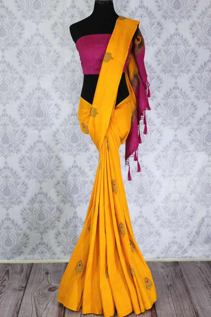 Bright yellow muga Banarasi saree with buta buy online in USA. Shop the latest design Indian designer sarees from Pure Elegance clothing store in USA for women.-full view