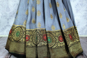 Elegant grey Muga Banarasi saree with zari buta buy online in USA. Explore a range of traditional Banarasi sarees in USA at Pure Elegance clothing store for women.-pleats