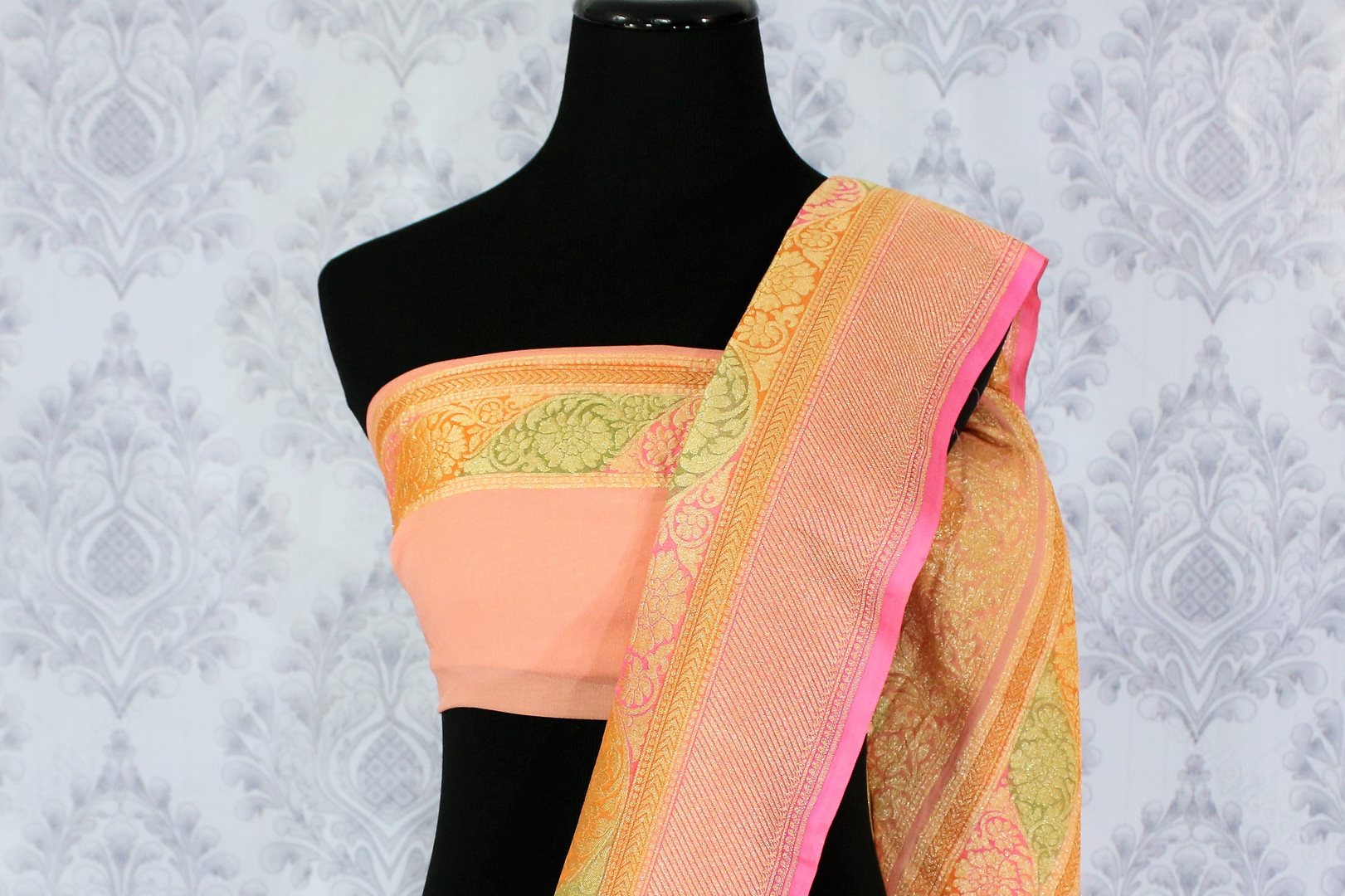 Beautiful peach color georgette Banarasi saree with zari buta buy online in USA. Explore a range of Indian designer sarees at Pure Elegance clothing store for women.-blouse pallu