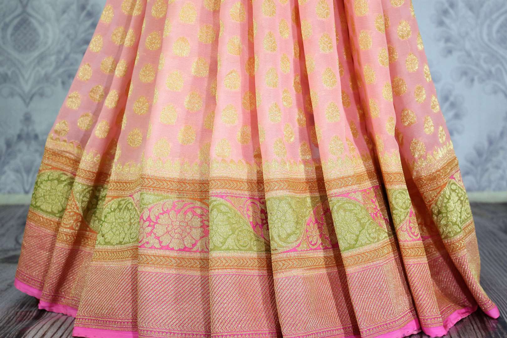 Soft pink color georgette Banarasi sari with zari buta buy online in USA. Explore a range of beautiful Indian designer sarees at Pure Elegance clothing store for women.-pleats