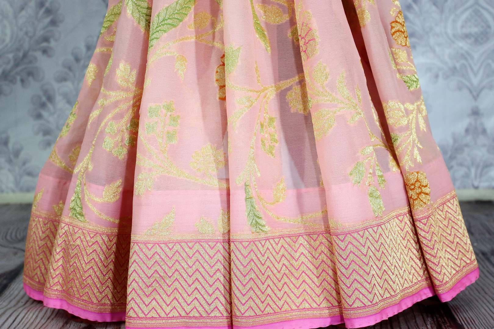 Beautiful pink color georgette Banarasi saree with floral design buy online in USA. Explore a range of Indian designer sarees at Pure Elegance clothing store for women.-pleats