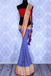Buy blue georgette Banarasi saree online in USA. The alluring design of the saree with red zari border and buta makes it perfect for parties and festivals. Select from an exquisite collection of traditional Indian Banarasi sarees, designer saris at Pure Elegance clothing store or shop online.-full view