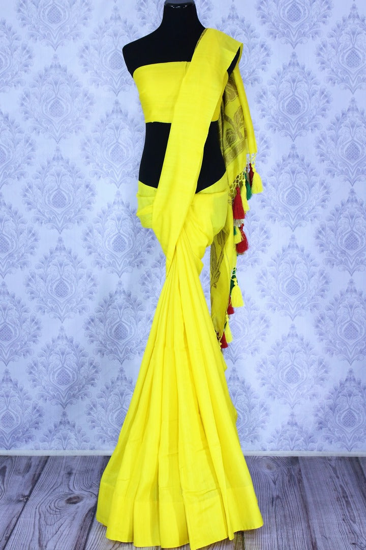 Buy lemon yellow muga Banarasi sari online in USA. The bright saree is a great choice for a classic Indian saree look at special occasions. Select from an exquisite collection of traditional Indian Banarasi sarees, silk sarees at Pure Elegance clothing store or shop online for weddings, parties, and festivals.-full view